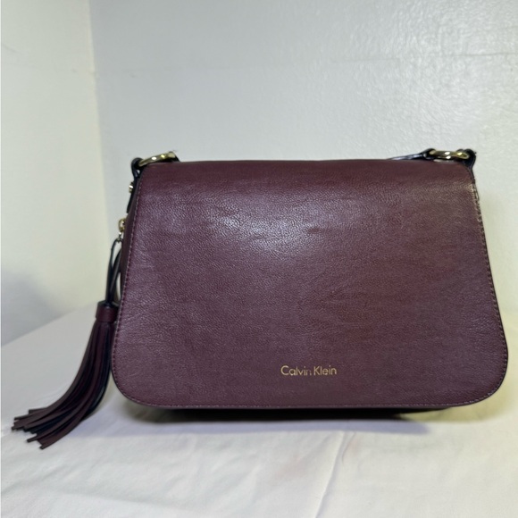 Calvin Klein Handbags - Calvin Klein Crossbody bag Wine/gold color adjustable strap 12X10x2 inches